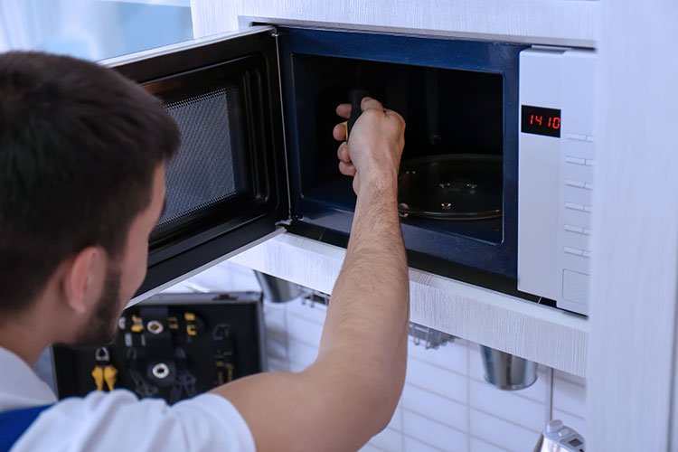 Microwave OTG technician Mr. Abhijit Samanta in Belgharia